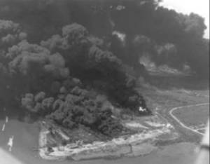 an aerial photograph of a fire on the S.S. Grand Camp anchored off Texas City, TX